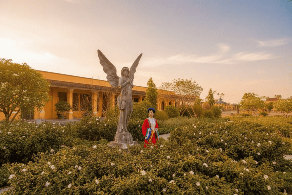 An Dinh Palace's Bach Tra Garden - Where the elegant beauty of camellias blends with the lush greenery, bringing tranquility to the soul